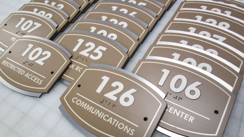 Interior ADA compliant room ID signage for a military base. Built and installed by Signgeek. 