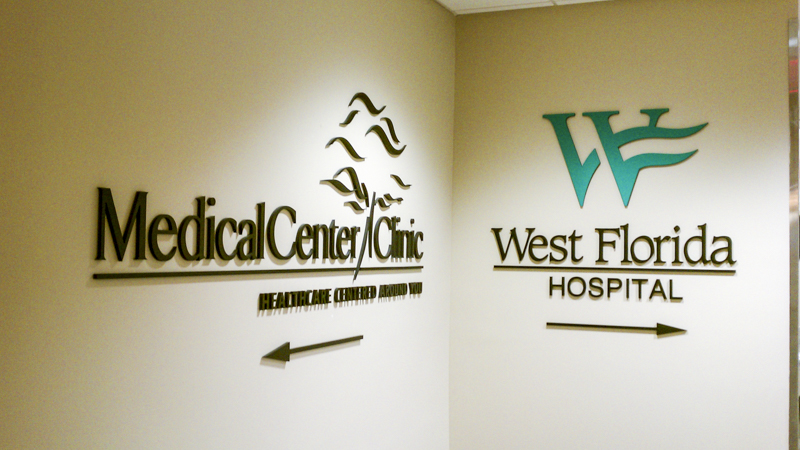 Directional signage for West Florida Hospital and Medical Center Clinic. Manufactured and installed by Signgeek. 