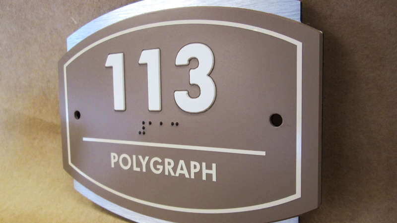 ADA compliant room id signage for a Navy base. Manufactured and installed by Signgeek. 