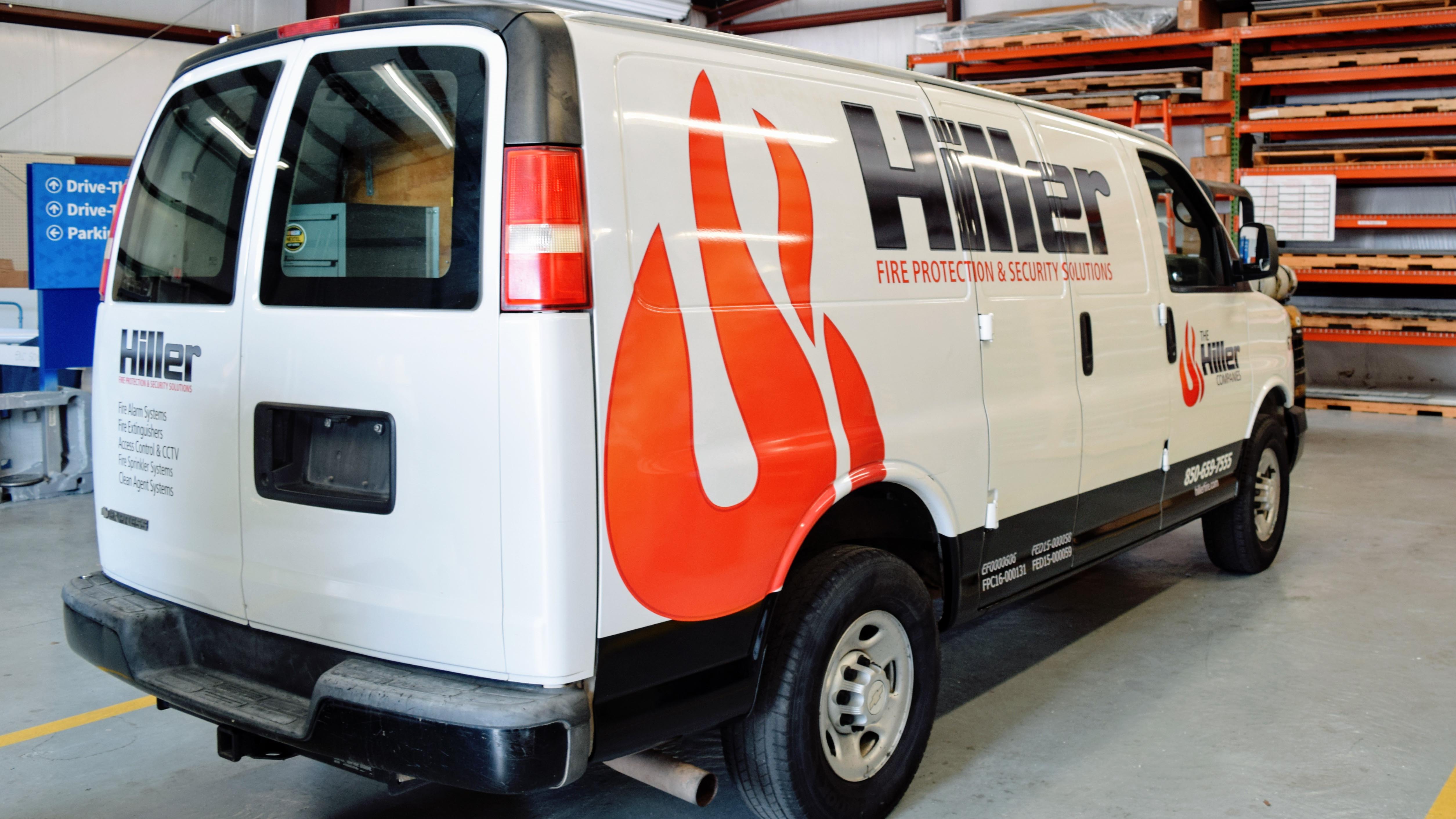 Fleet wraps on new Hiller vans - signgeek