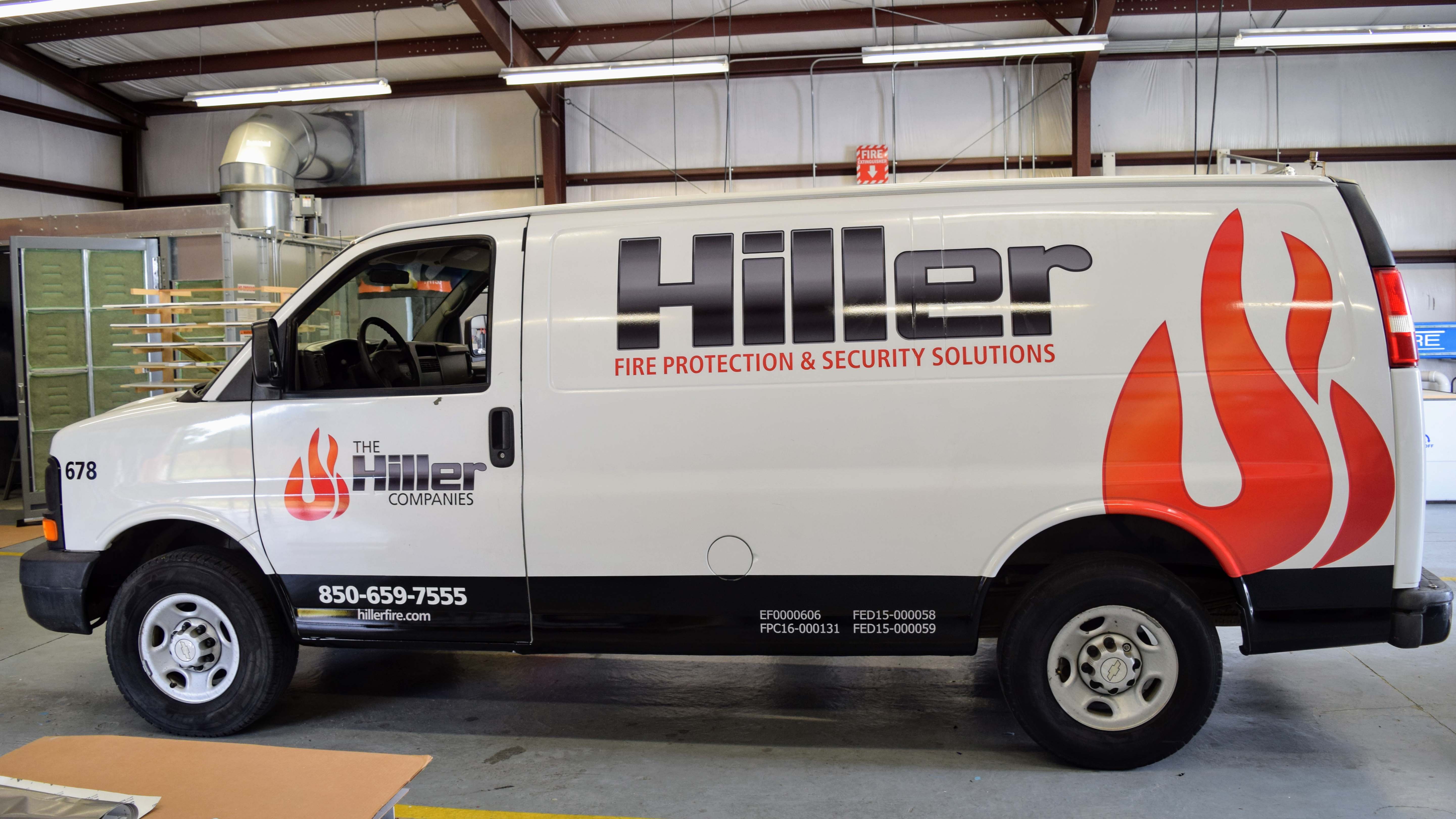 Fleet wraps and graphics on new Hiller vans - signgeek