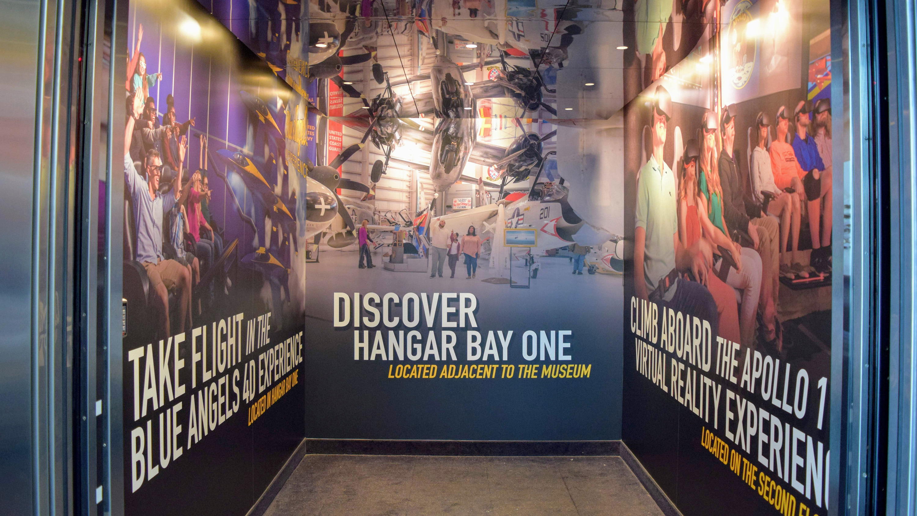 Elevator interior vinyl wrap for Naval Aviation Museum - signgeek Environmental Graphics 