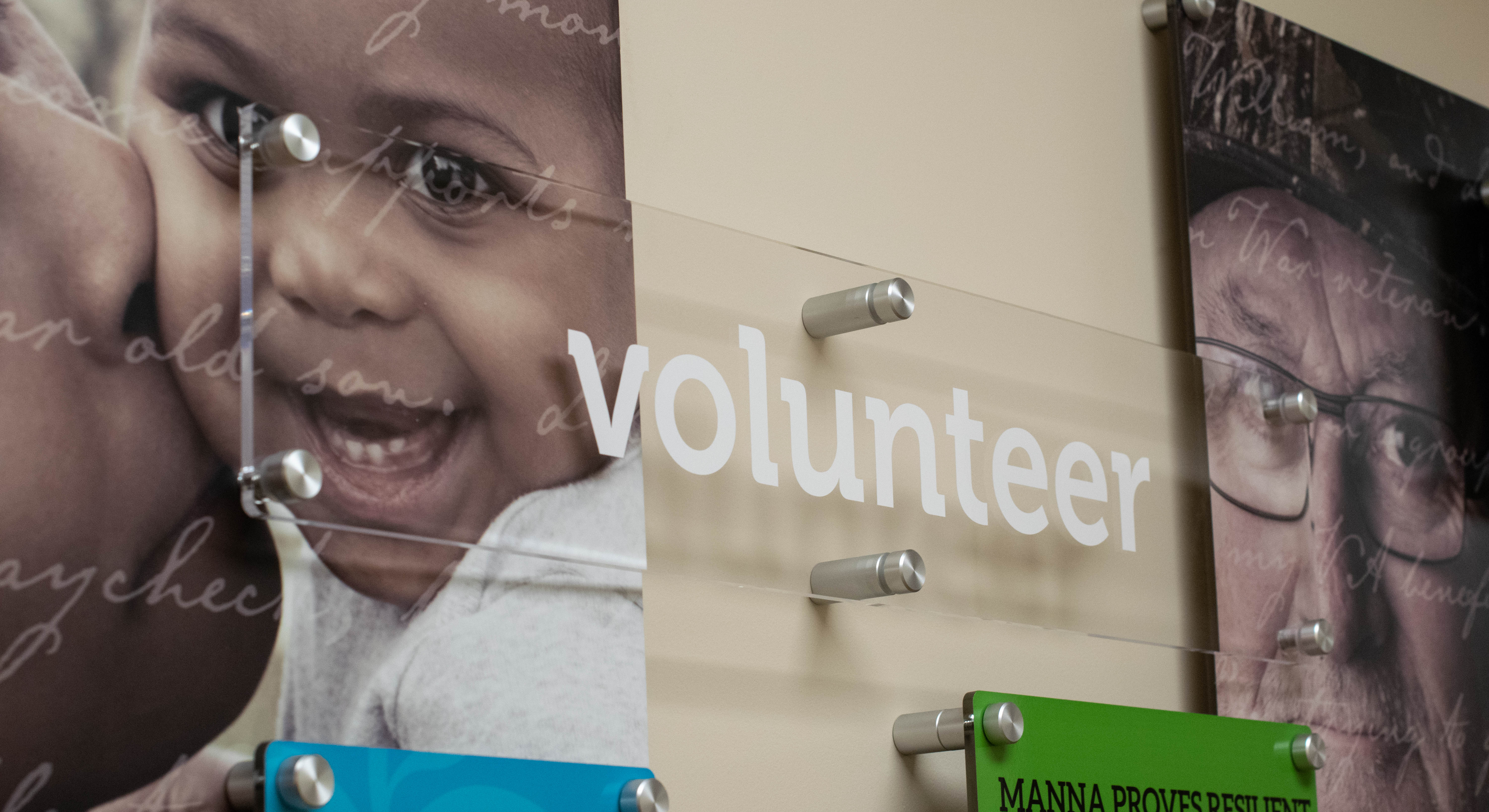 History donor wall at Manna Food Pantries Center for Hope - signgeek Custom Displays & Historical Timelines 