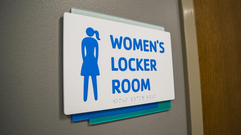 Interior ADA compliant locker room signage for the downtown Pensacola YMCA. Fabricated and installed by Signgeek. 