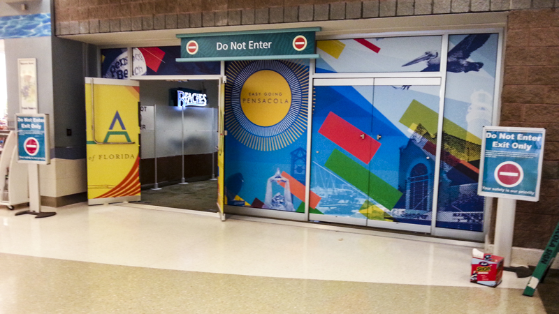 Wayfinding and window graphics for Pensacola International Airport - Signgeek Environmental Graphics 