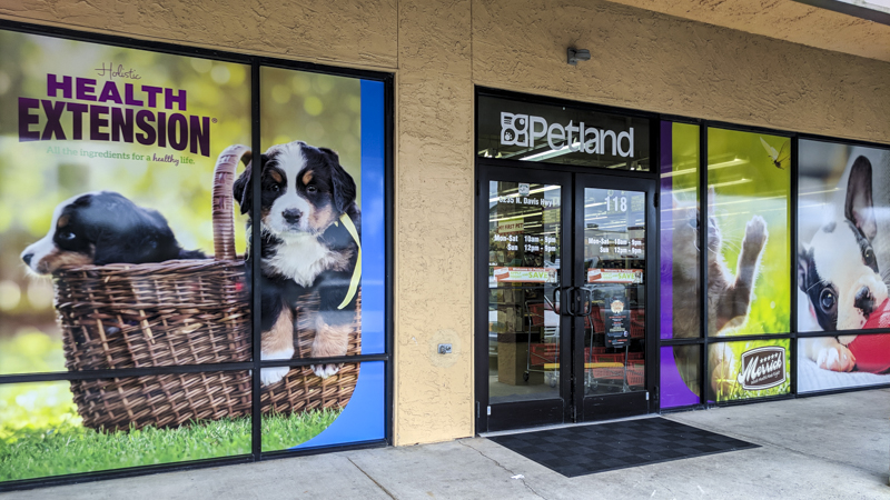 Window graphics for the exterior of Petland - signgeek Environmental Graphics 