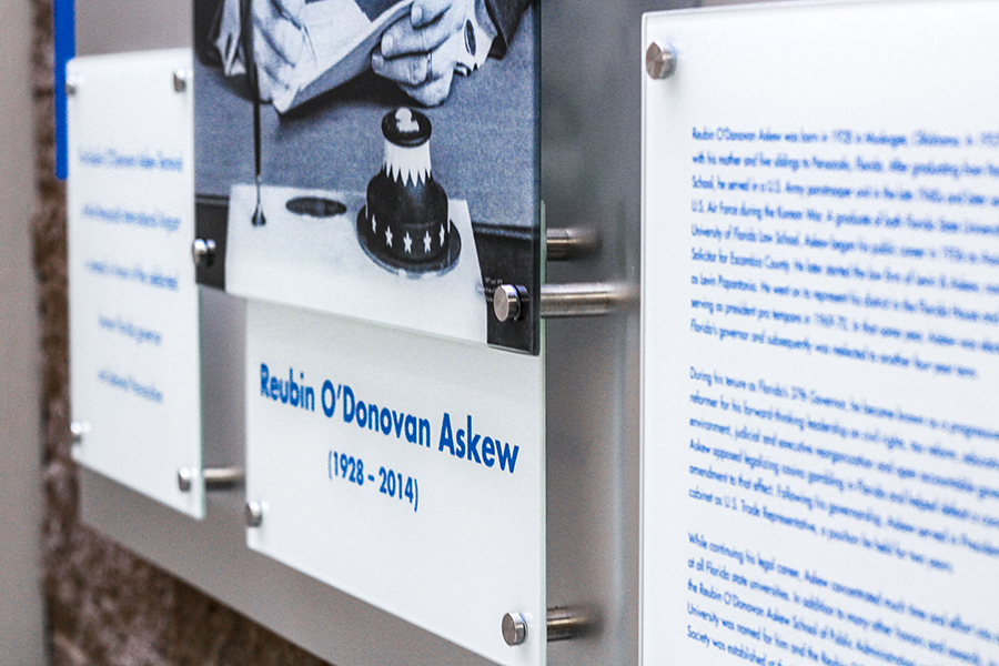 Acrylic standoff display at Pensacola International Airport - signgeek Environmental Graphics