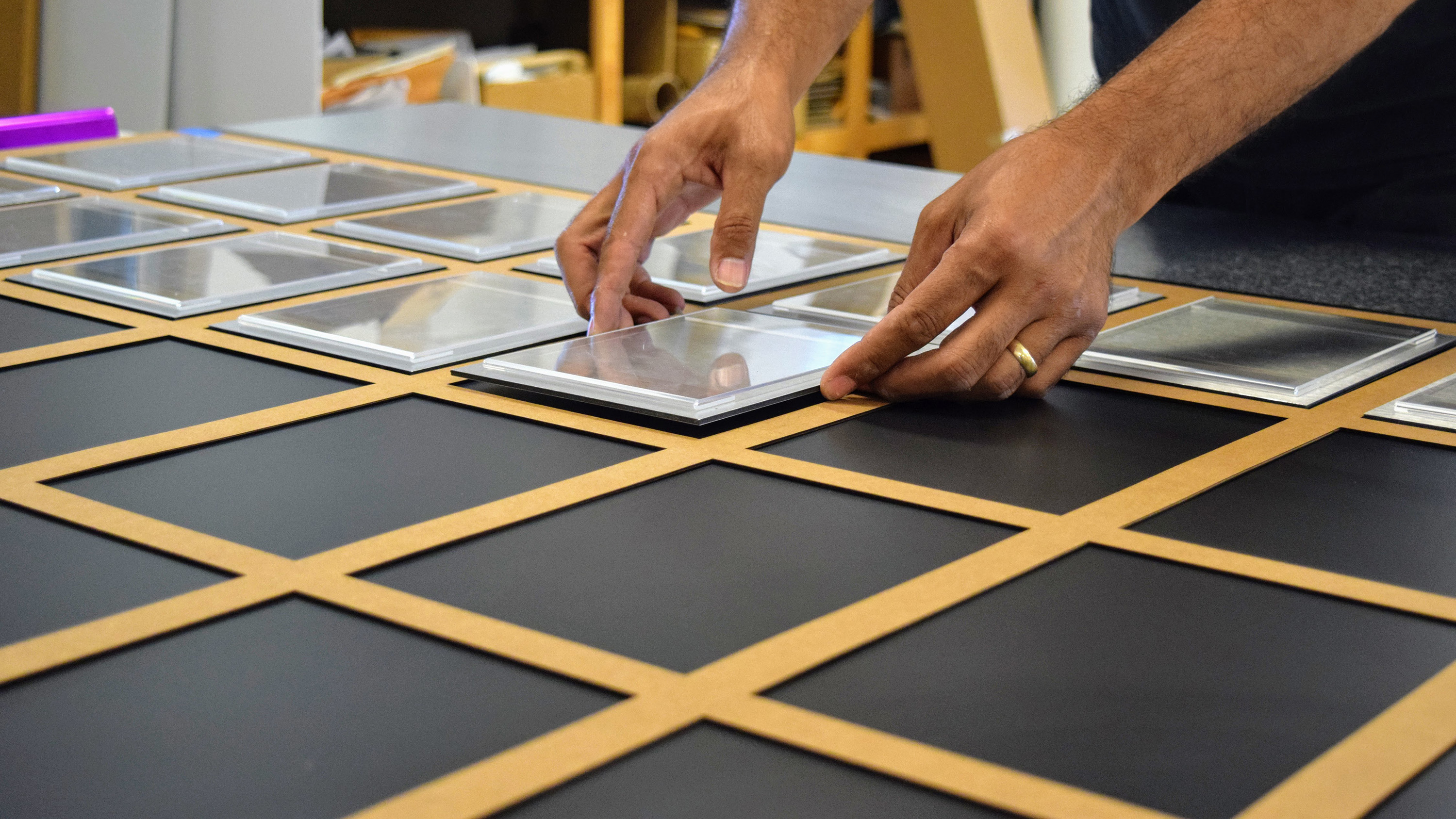 Employee photo wall assembly for Bonner Springs Police Department